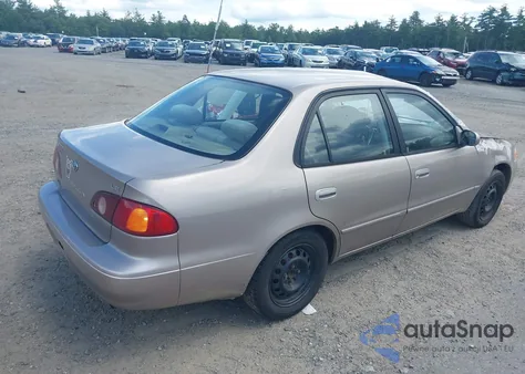2002 Toyota Corolla Le from USA, damaged, VIN 2T1BR12E72C537034
